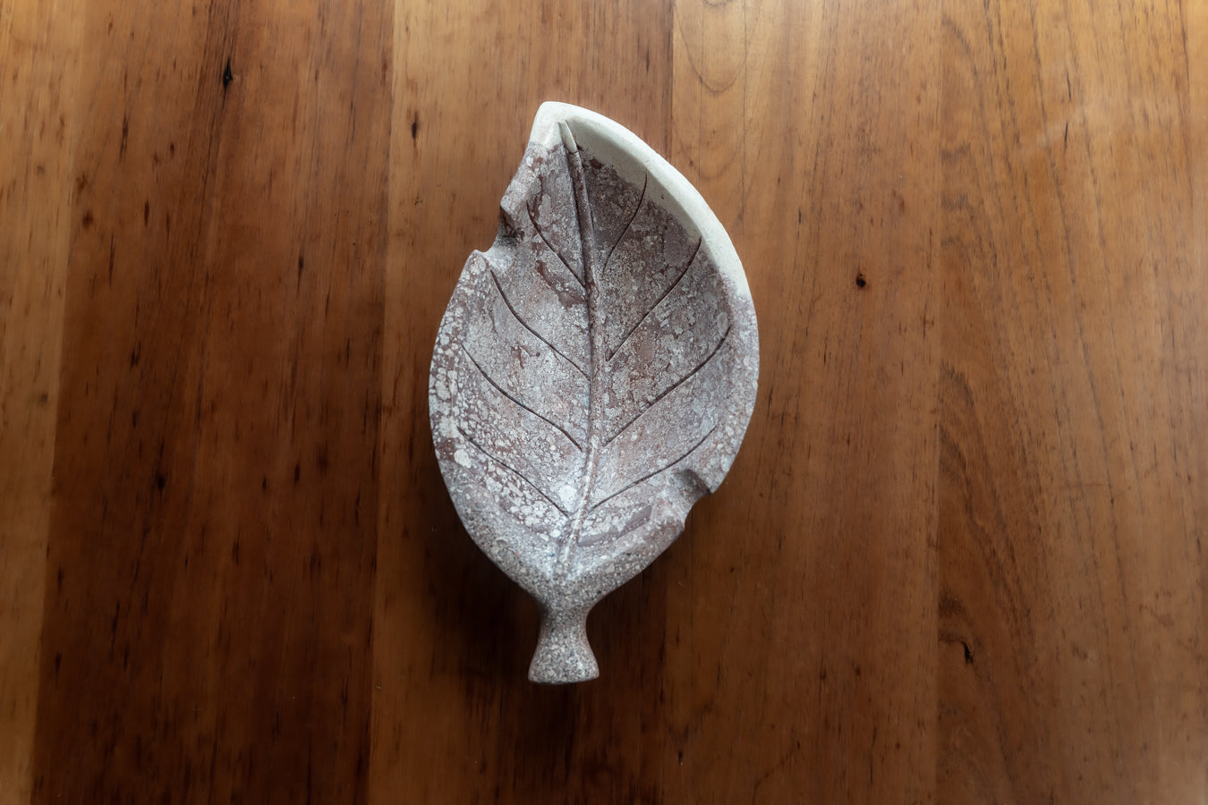 Hand carved stone tobacco leaf ashtray