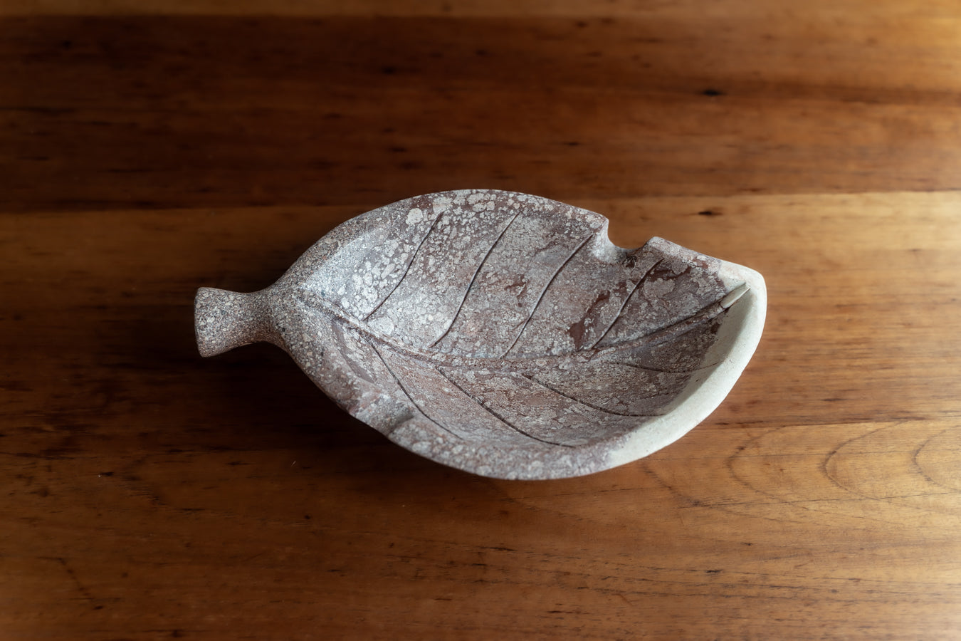 Hand carved stone tobacco leaf ashtray
